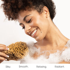 Naroa Soft Natural Sponge Large held in hand for easy daily use.