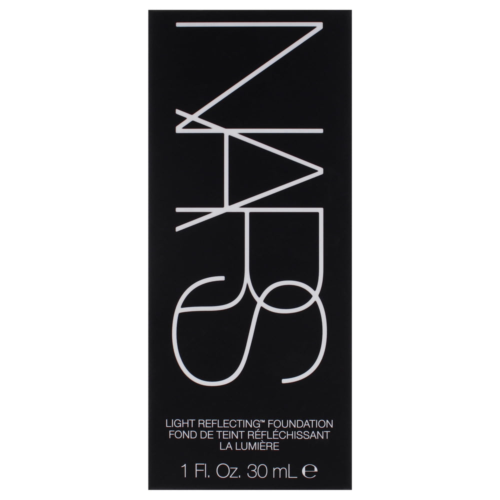 Applying NARS Light Reflecting Foundation M2 Santa Fe for even coverage.