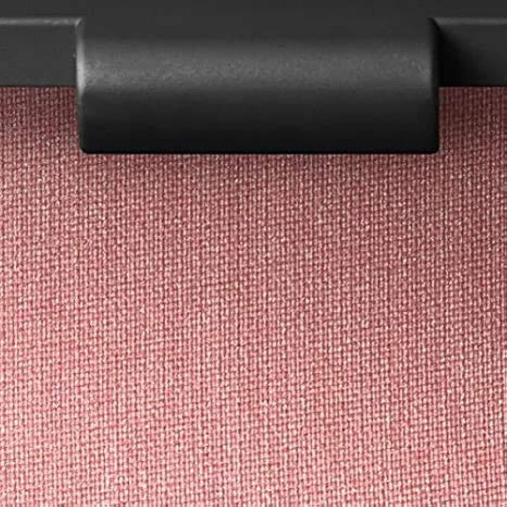 NARS Orgasm blush on finger swatch showing blendable texture and easy layering.