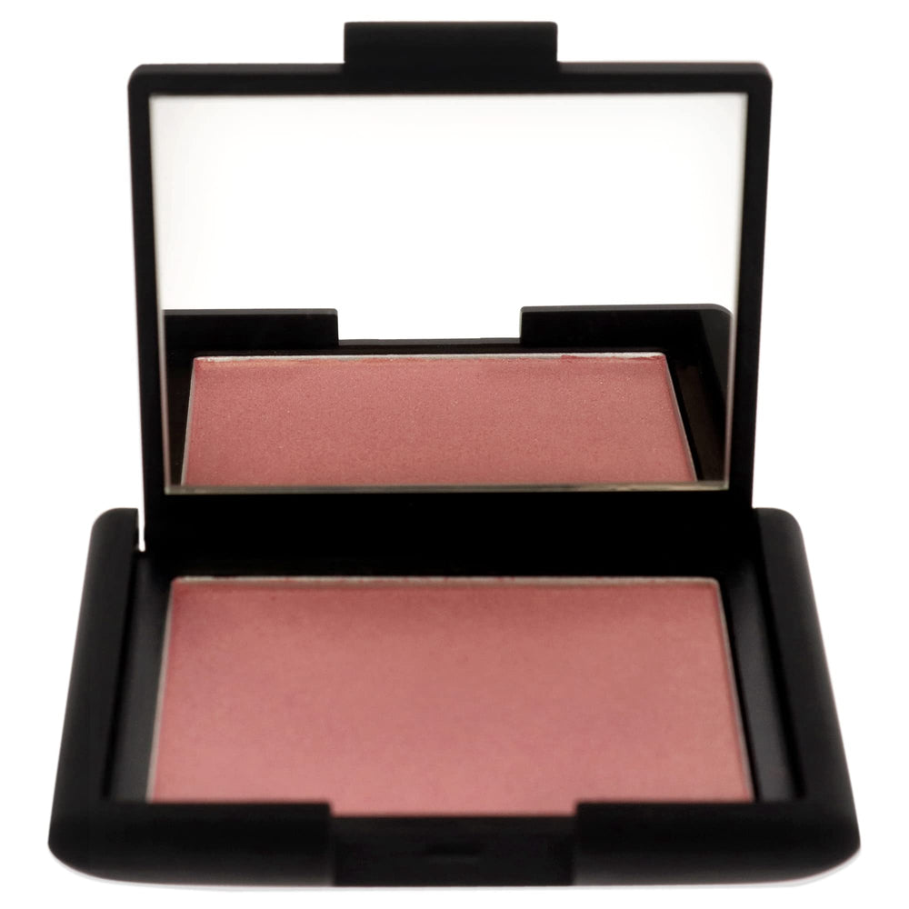 NARS Orgasm blush swatch on skin demonstrates buildable color with radiant finish.