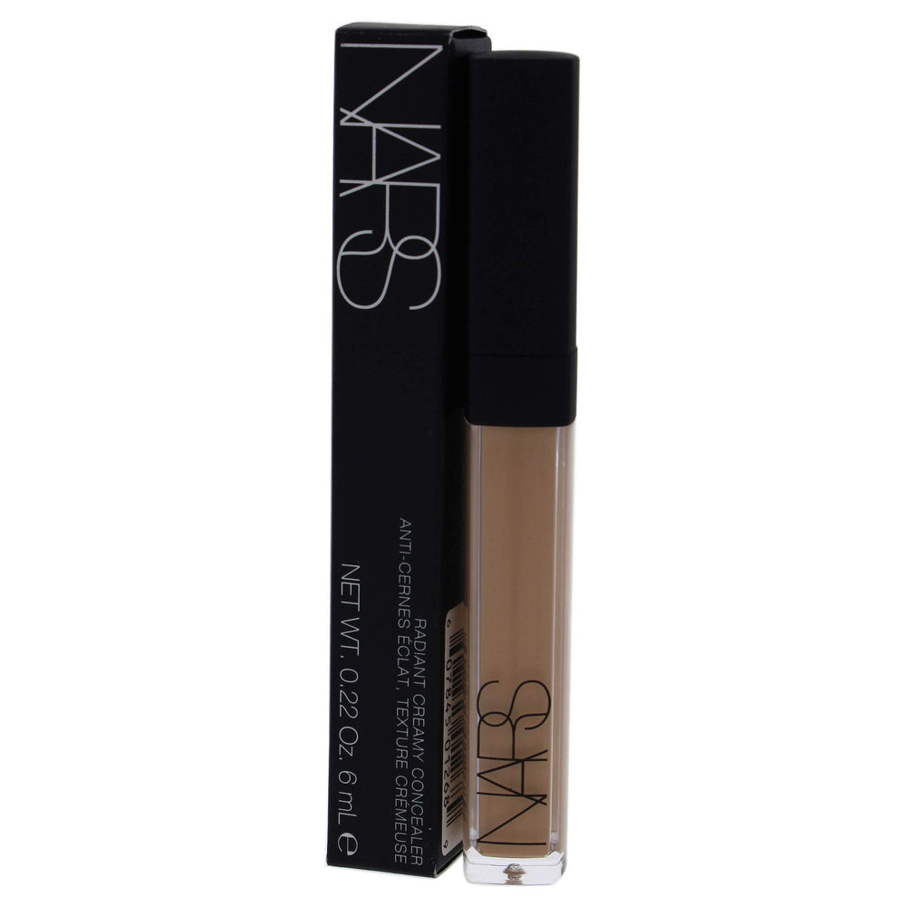 NARS concealer No.1.5 Macadamia demonstrates under-eye coverage with soft matte finish.