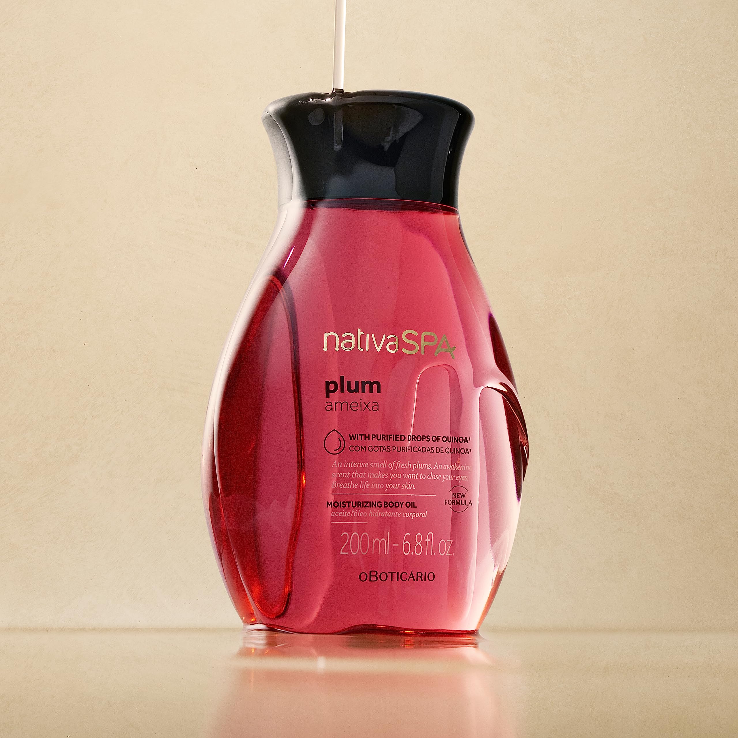 NATIVA SPA Plum Body Oil pour — easy application for quick hydration after shower.