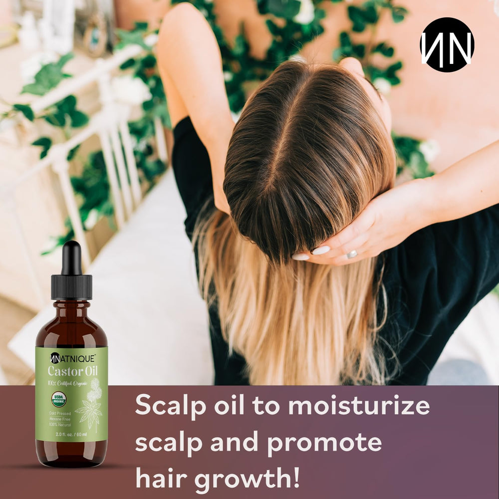 Natnique Castor Oil on the scalp supports hydration and scalp comfort.