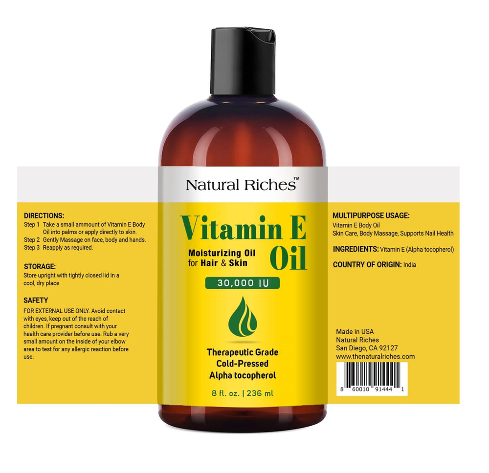 Natural Riches Vitamin E oil dropper in use for easy skin application.