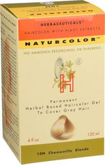 Naturcolor protective gloves shield hands during at-home dyeing.