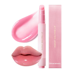 Nature Republic Honey Melting Lip Plumping 11 Pink tube closeup emphasizes hydrating texture