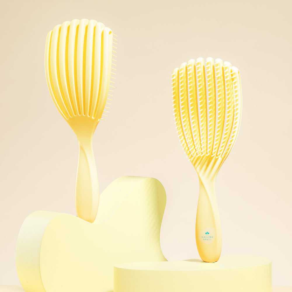 Nature Spell FlexiFlow Detangling Brush flex-technology close-up highlights adaptive strands.