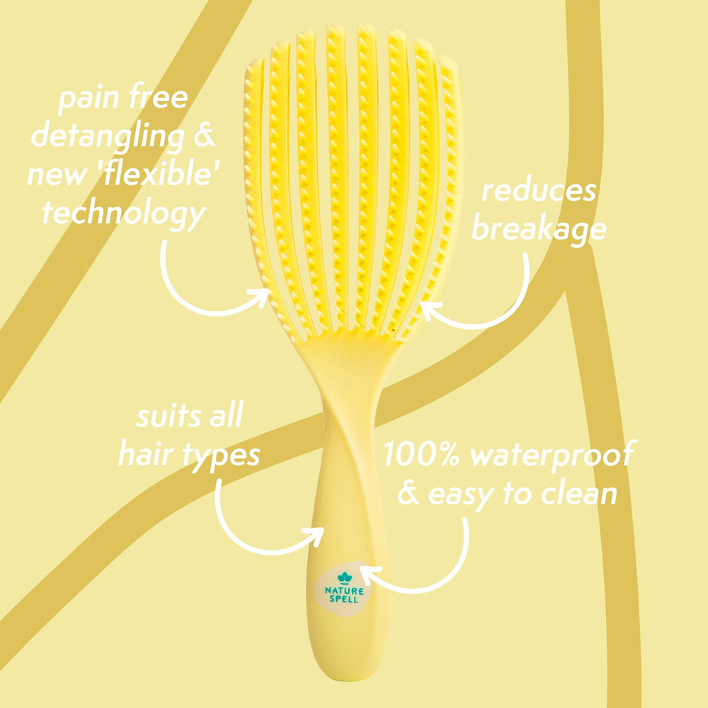 Nature Spell FlexiFlow Detangling Brush handle close-up highlights ergonomic grip.