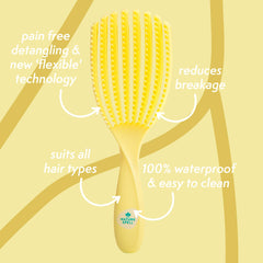 Nature Spell FlexiFlow Detangling Brush handle close-up highlights ergonomic grip.