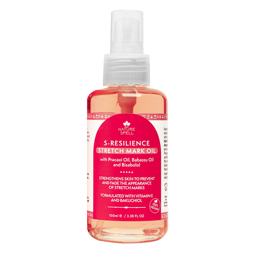 Nature Spell stretch mark oil bottle closeup shows premium formula for smoother skin