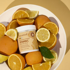 Nature Well quick-absorb cream massaged into skin for smooth texture.
