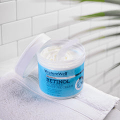 NATURE WELL Retinol Advanced Moisture Cream texture close-up reveals creamy consistency.