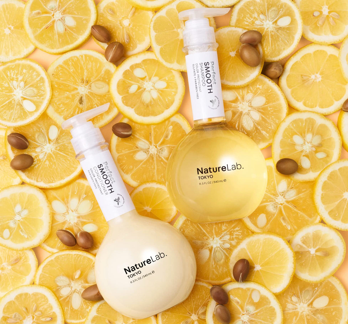 NatureLab Tokyo Perfect Smooth Shampoo bottle demonstrates frizz control for sleek hair.