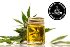 Naturevibe Botanicals neem oil label closeup highlights 100% pure natural quality.