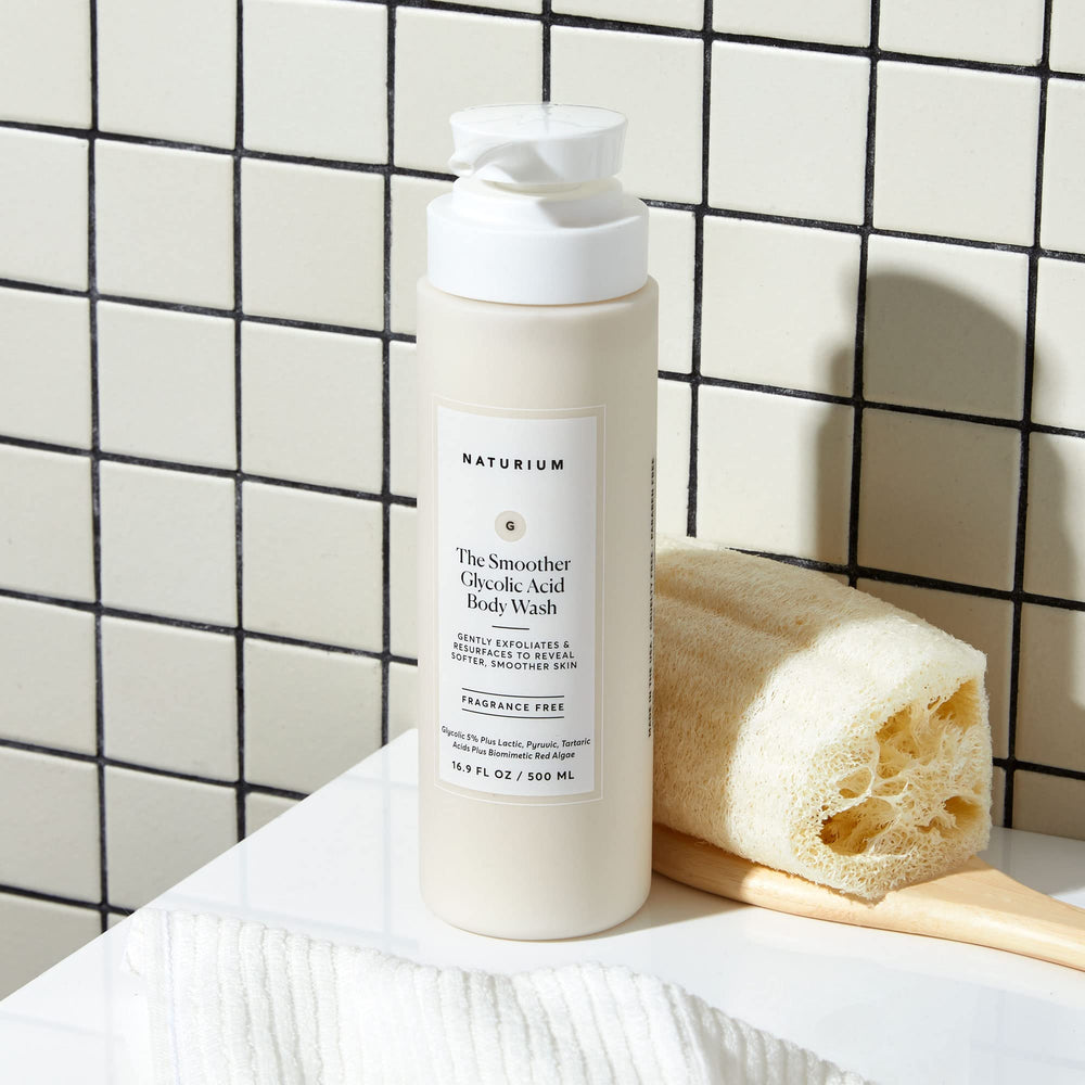 Naturium Smoother body wash texture close-up indicating creamy foam and exfoliation feel