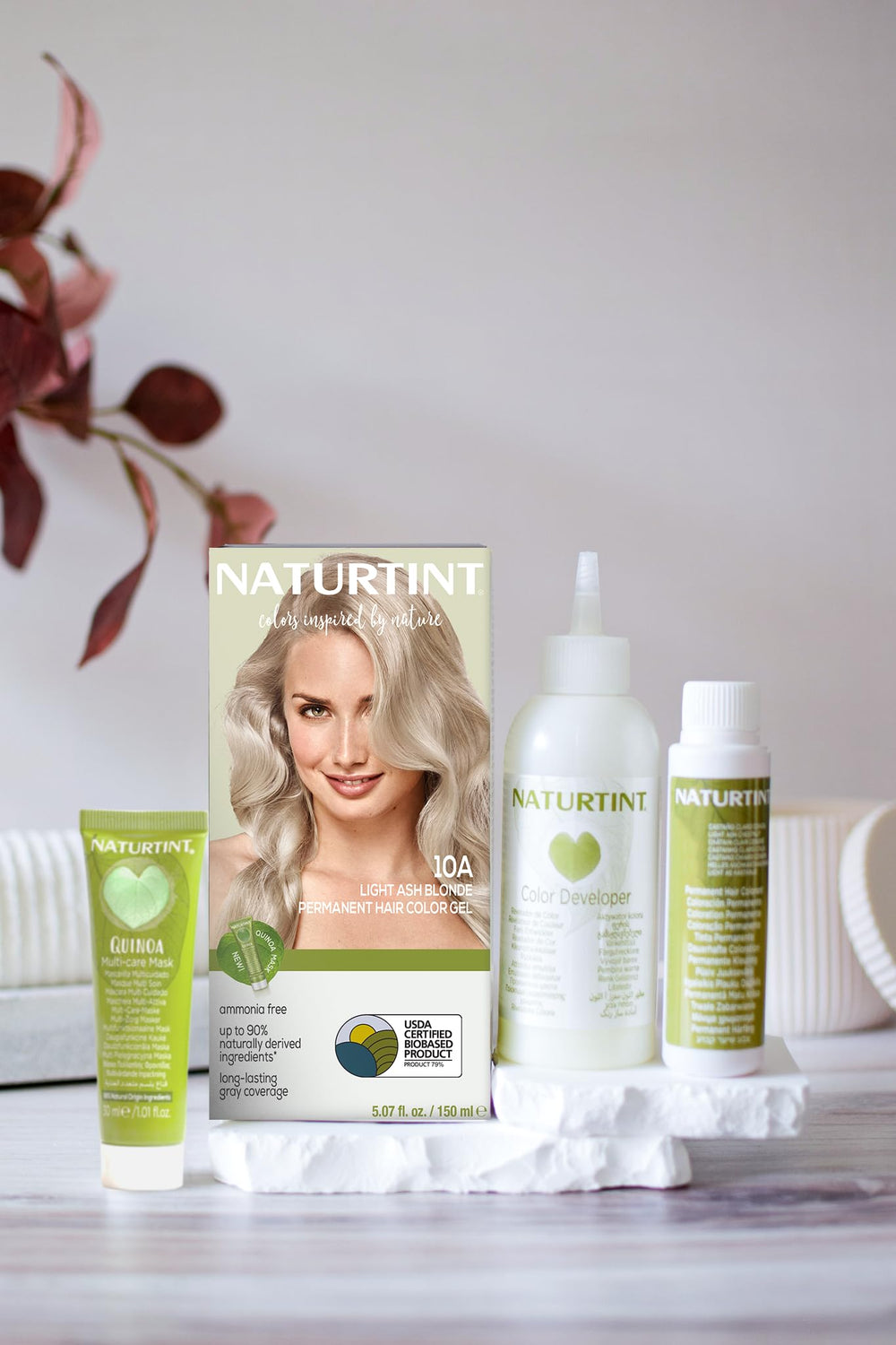 Naturtint 10A before-after hair strand demonstrates gray coverage potential