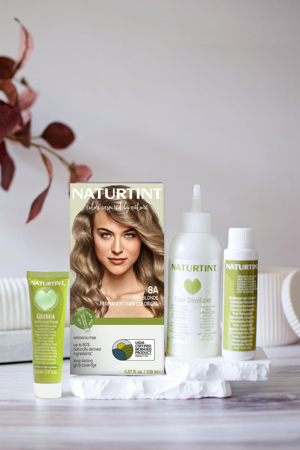 Naturtint 8A Ash Blonde swatches illustrate natural shade options and even coverage.