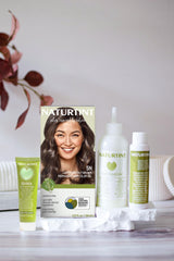 Naturtint plant-based formula bottle highlights nourishing care during color processing.