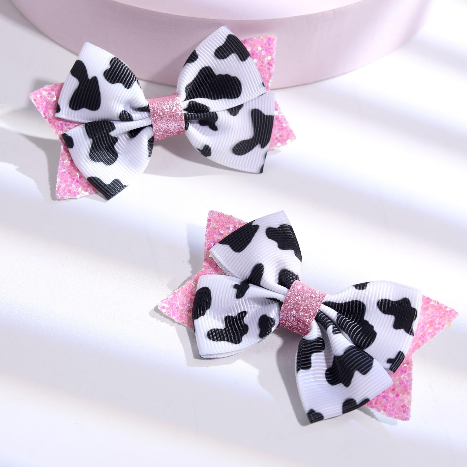 NCMAMA pink bow for Christmas or party looks offering playful cow design.