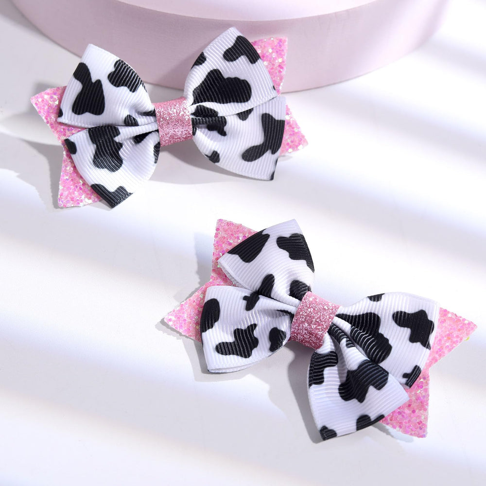 NCMAMA pink bow for Christmas or party looks offering playful cow design.