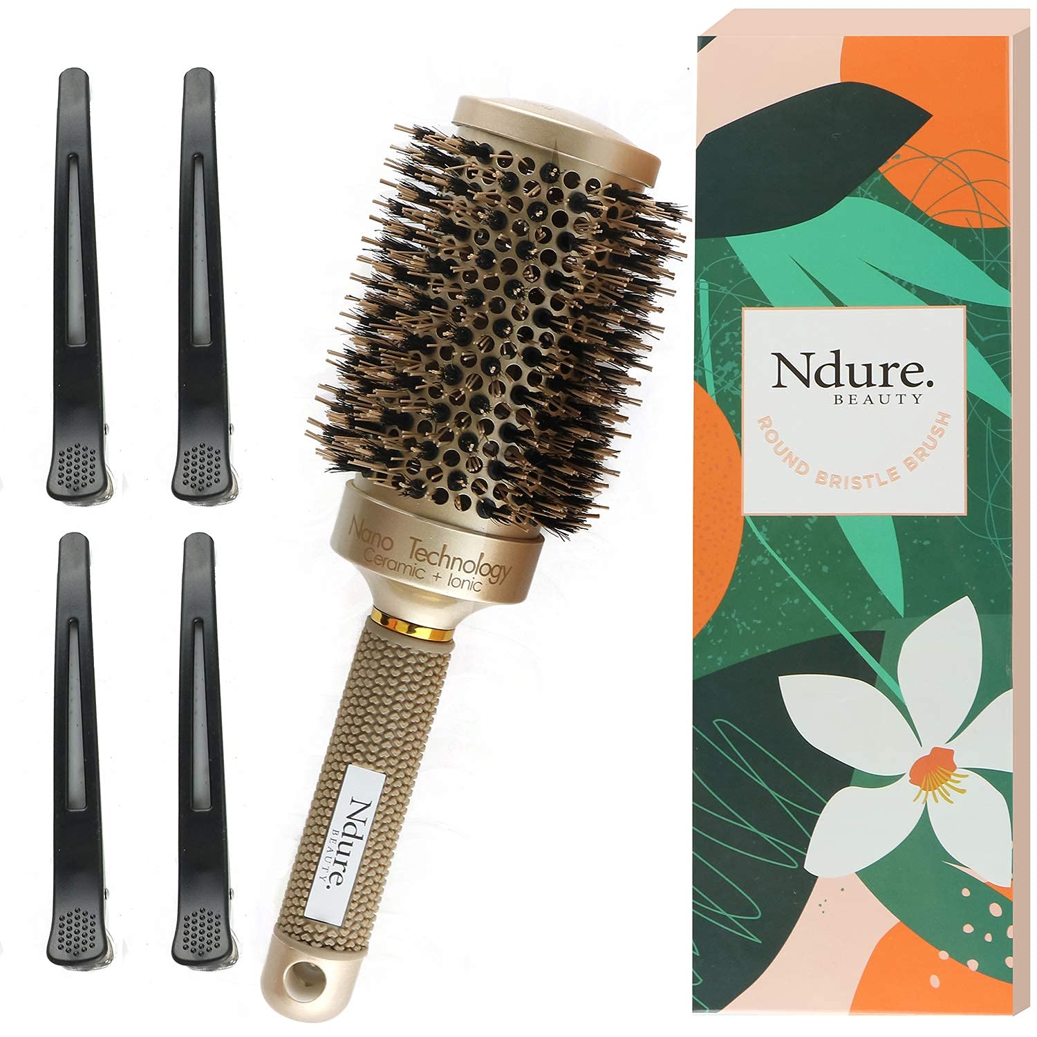 Ndure Beauty brush close-up highlighting boar bristles for detangling and shine