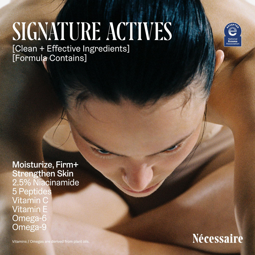 Nécessaire The Body Lotion 2.4 oz bottle on sink for travel-ready routine.