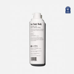 Nécessaire Body Serum application on dry skin for moisture.
