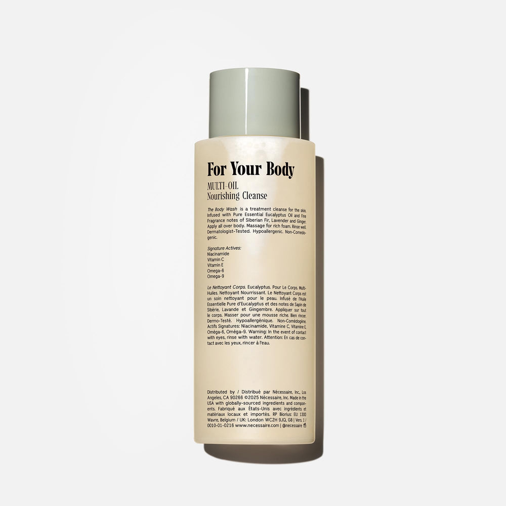 Nécessaire Eucalyptus body wash label closeup highlights niacinamide and natural oils.