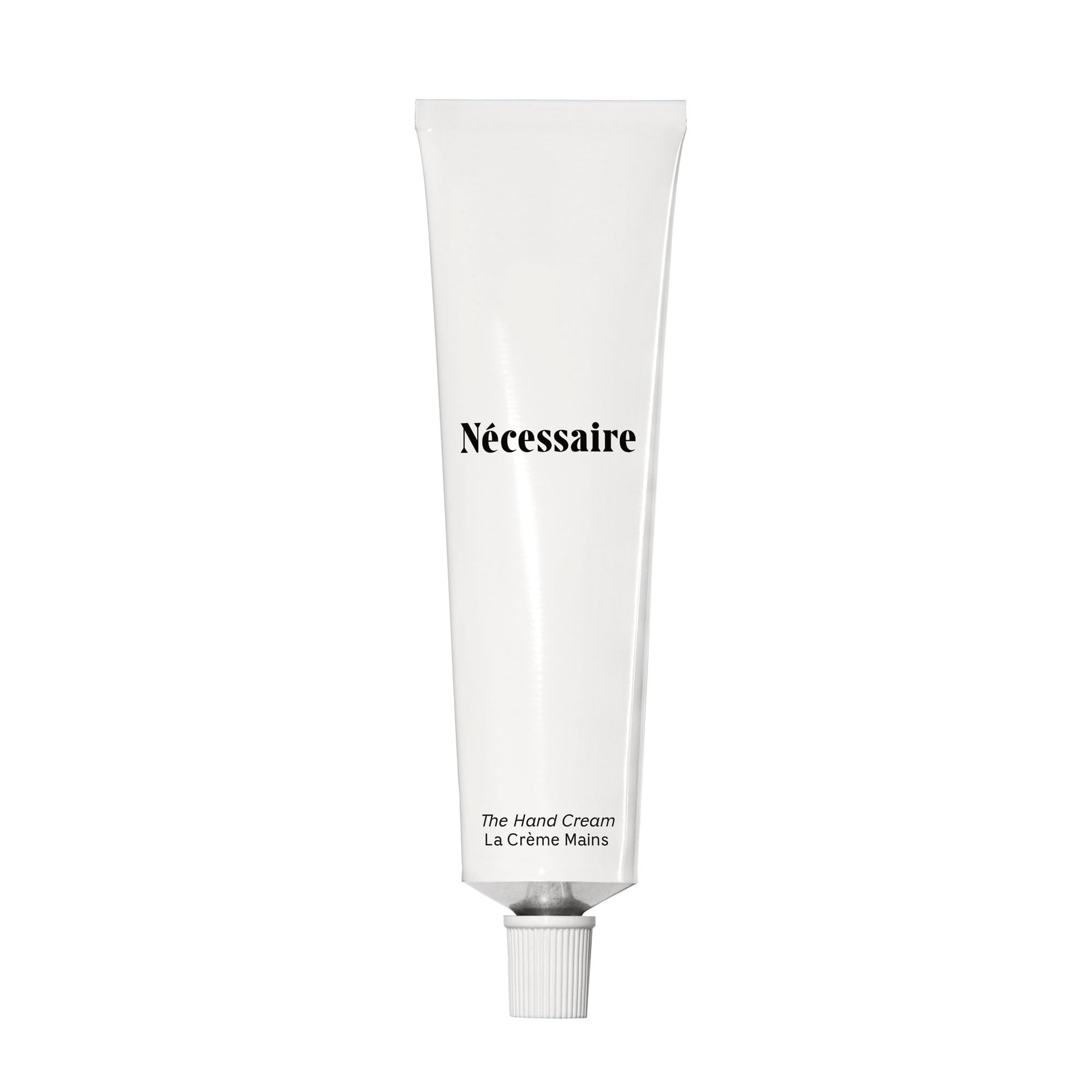 Nécessaire Hand Cream application close-up showing smooth texture and quick absorption.