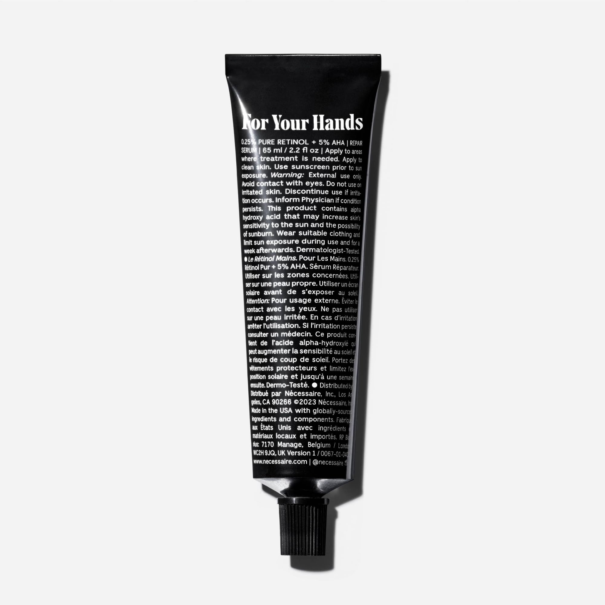 necessaire hand retinol ingredients label highlights retinol and peptides