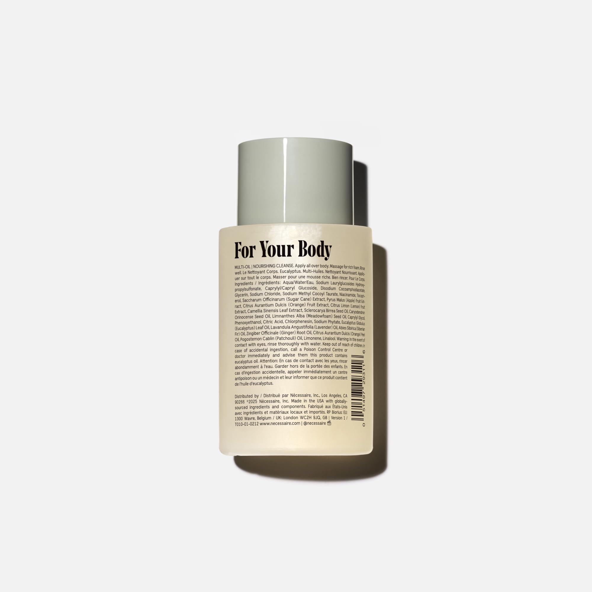 Nécessaire Mini The Body Wash daily-use scene on a shower shelf signals easy routine