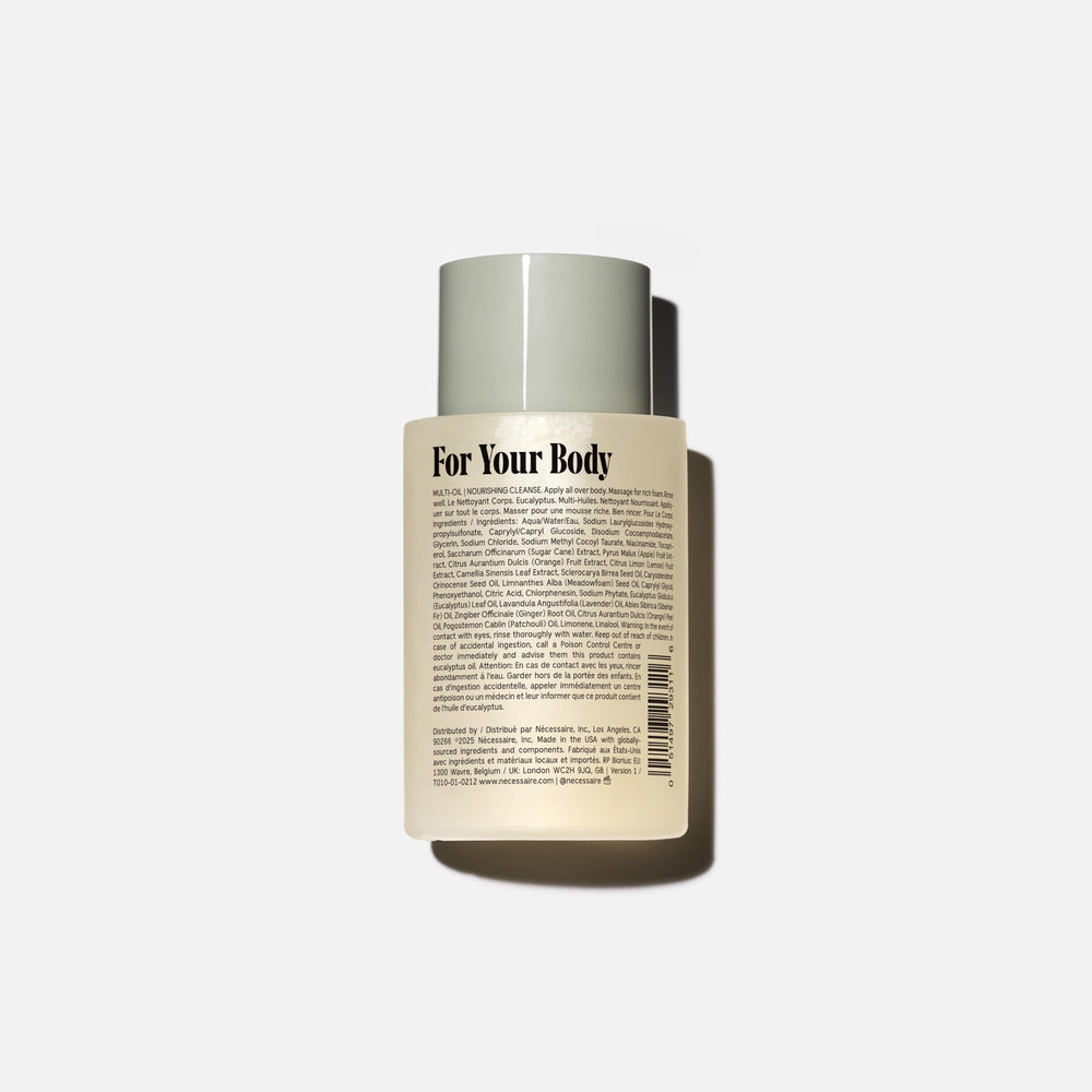 Nécessaire Mini The Body Wash daily-use scene on a shower shelf signals easy routine