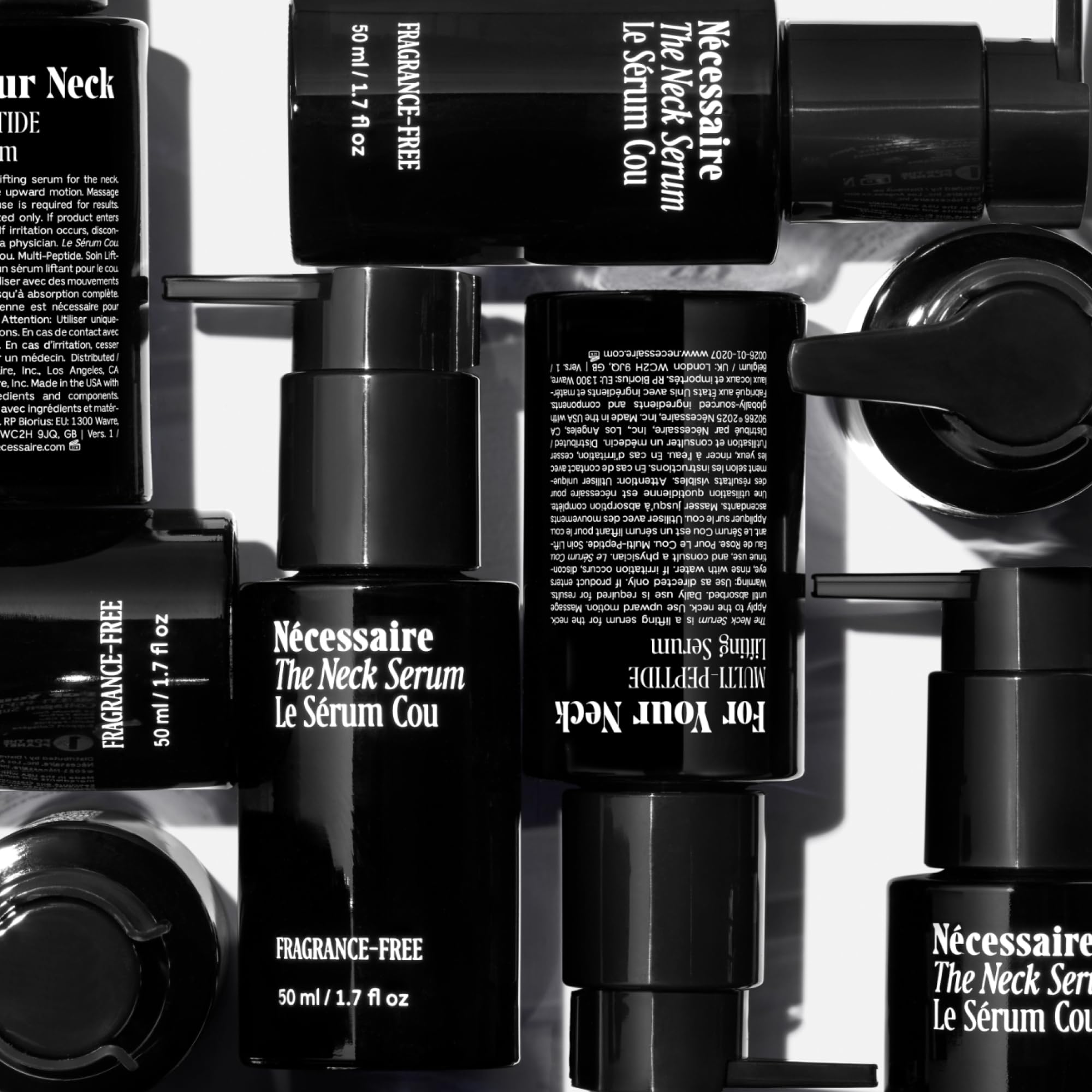 Nécessaire The Neck Serum drops on neck illustrate fast-absorbing texture.