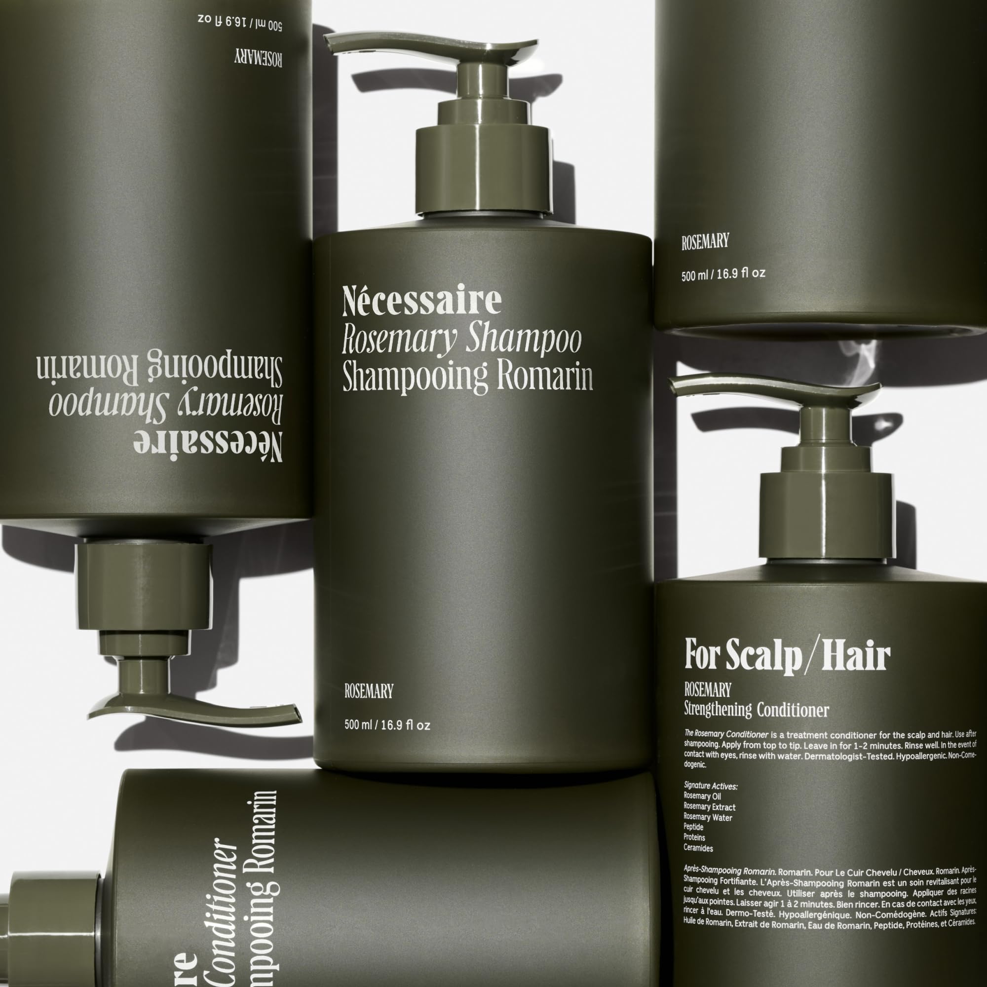 Nécessaire Rosemary Conditioner bottle conveys detangling benefits for soft, manageable hair.