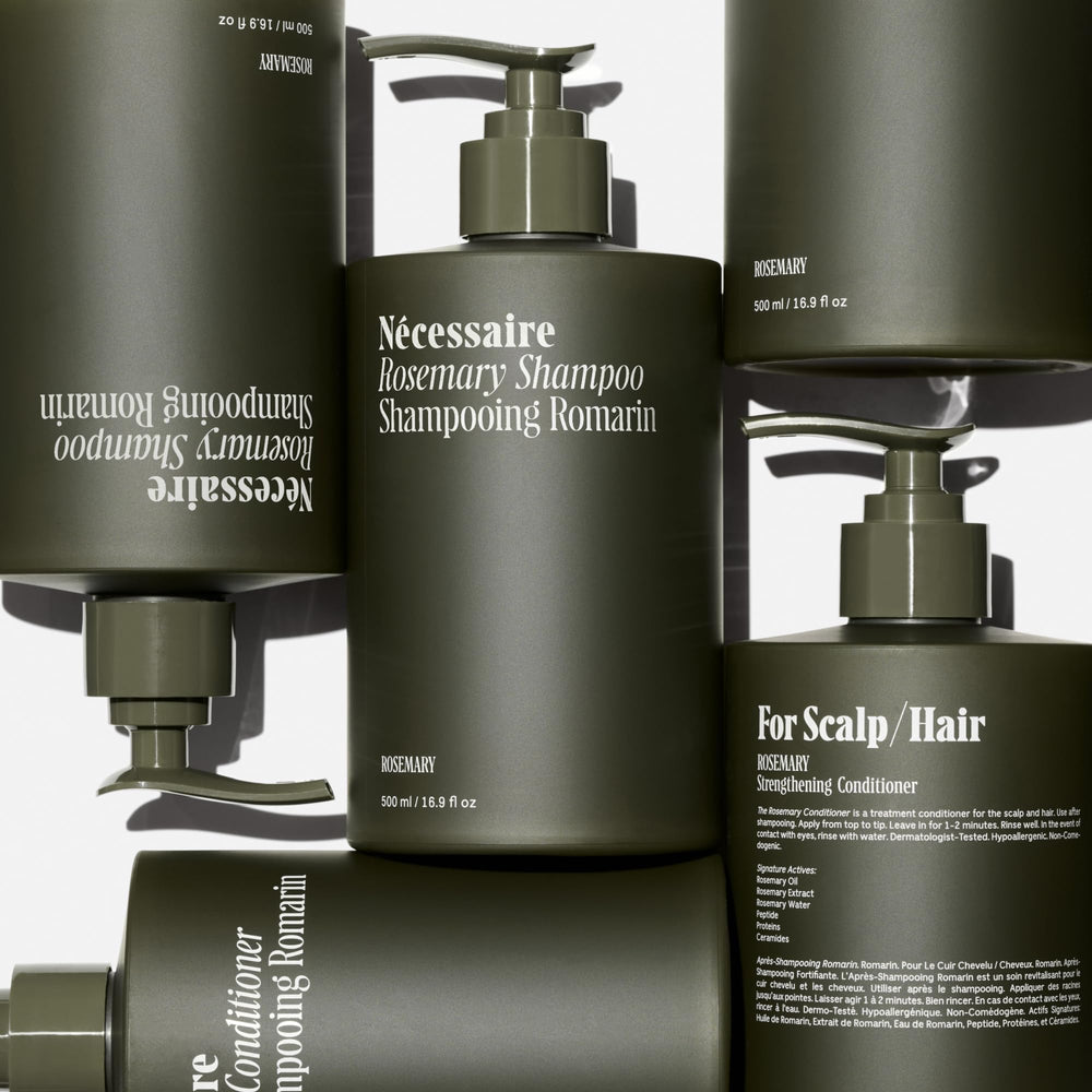 Nécessaire Rosemary Conditioner bottle conveys detangling benefits for soft, manageable hair.
