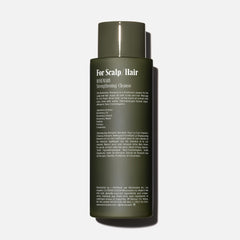 Close-up of Nécessaire Rosemary Shampoo ingredients featuring rosemary and ceramides