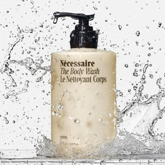 Nécessaire Santal rich foam lather spreading over skin.