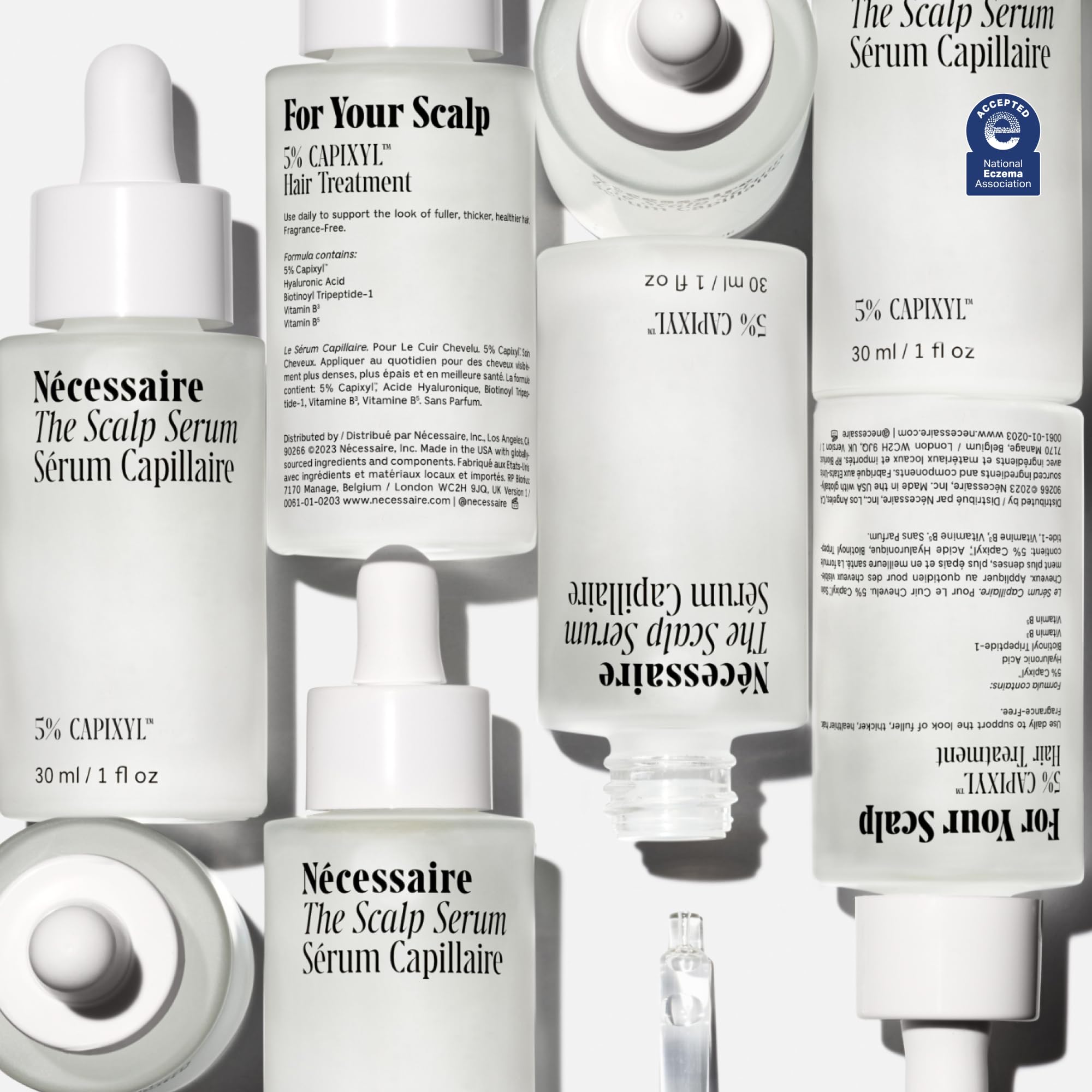 Nécessaire Scalp Serum on hair close-up showing hydration