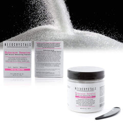NeedCrystals facial exfoliator spread on skin showing smooth texture