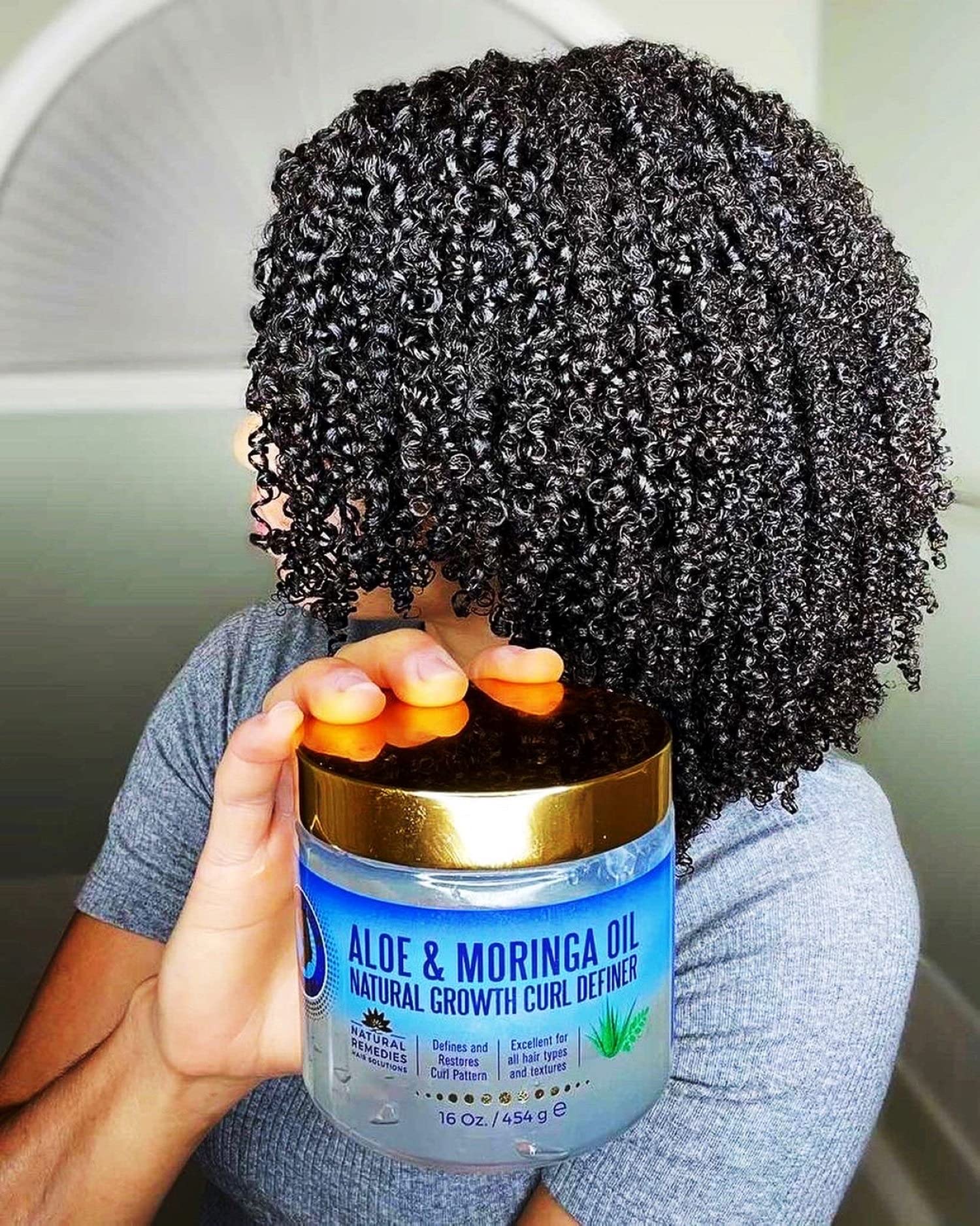 Nefertiti's Secrets dry-damaged-hair-revival highlights softer, revived textures.