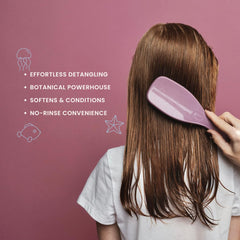 Nemah Kids Leave-In Detangler spray being dispensed for quick smoothing
