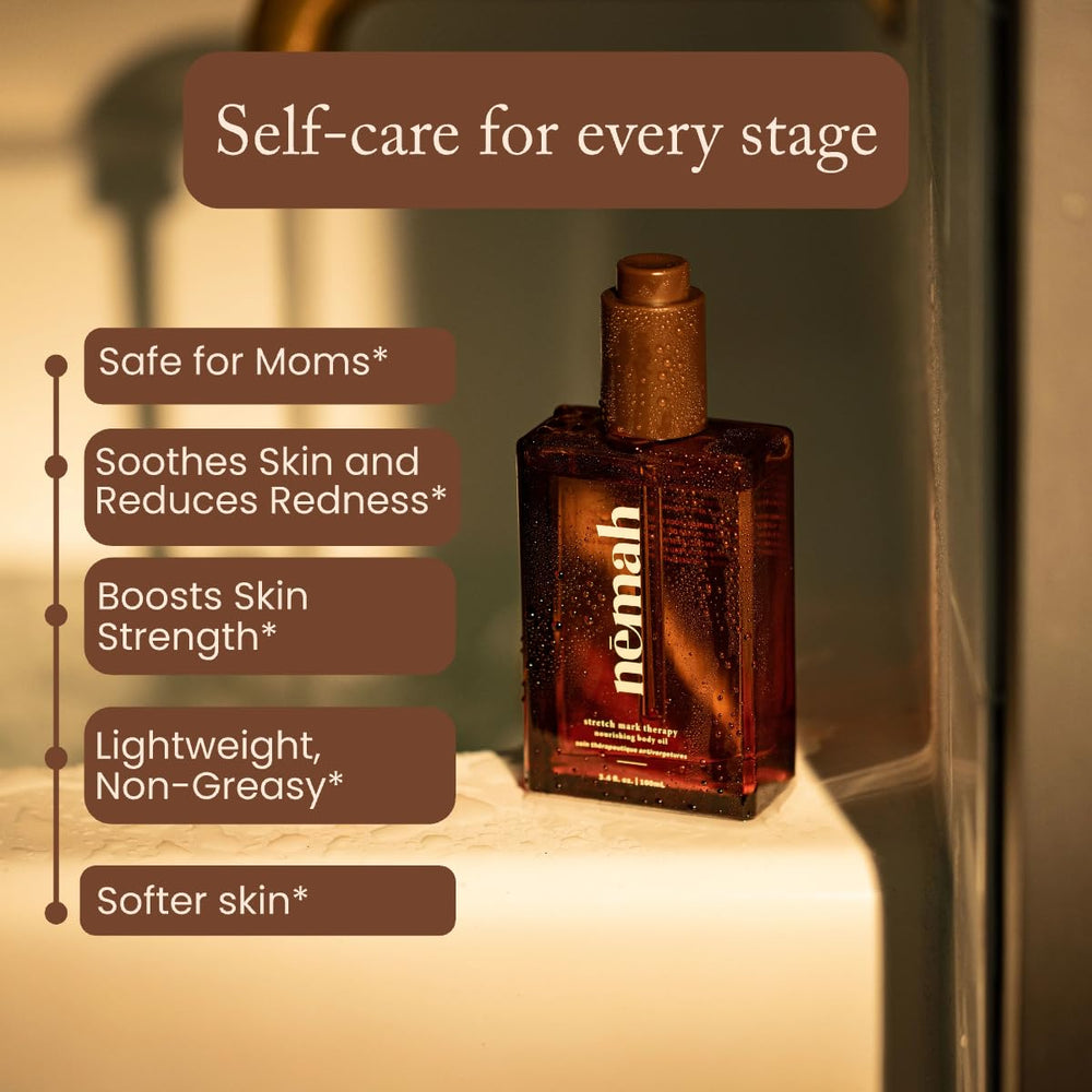 Nemah Nourishing Belly Oil being massaged onto a growing belly for dry skin relief.