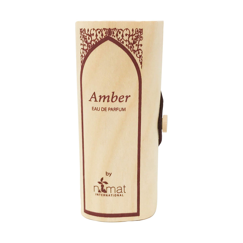 Nemat Amber Eau De Parfum Spray bottle with premium amber scent for daily wear.