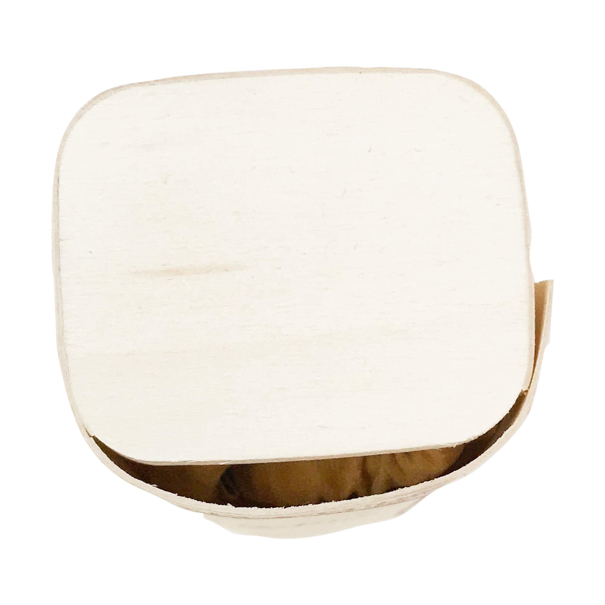 Nemat Amber perfume on table ambience suggests versatile use for occasions.