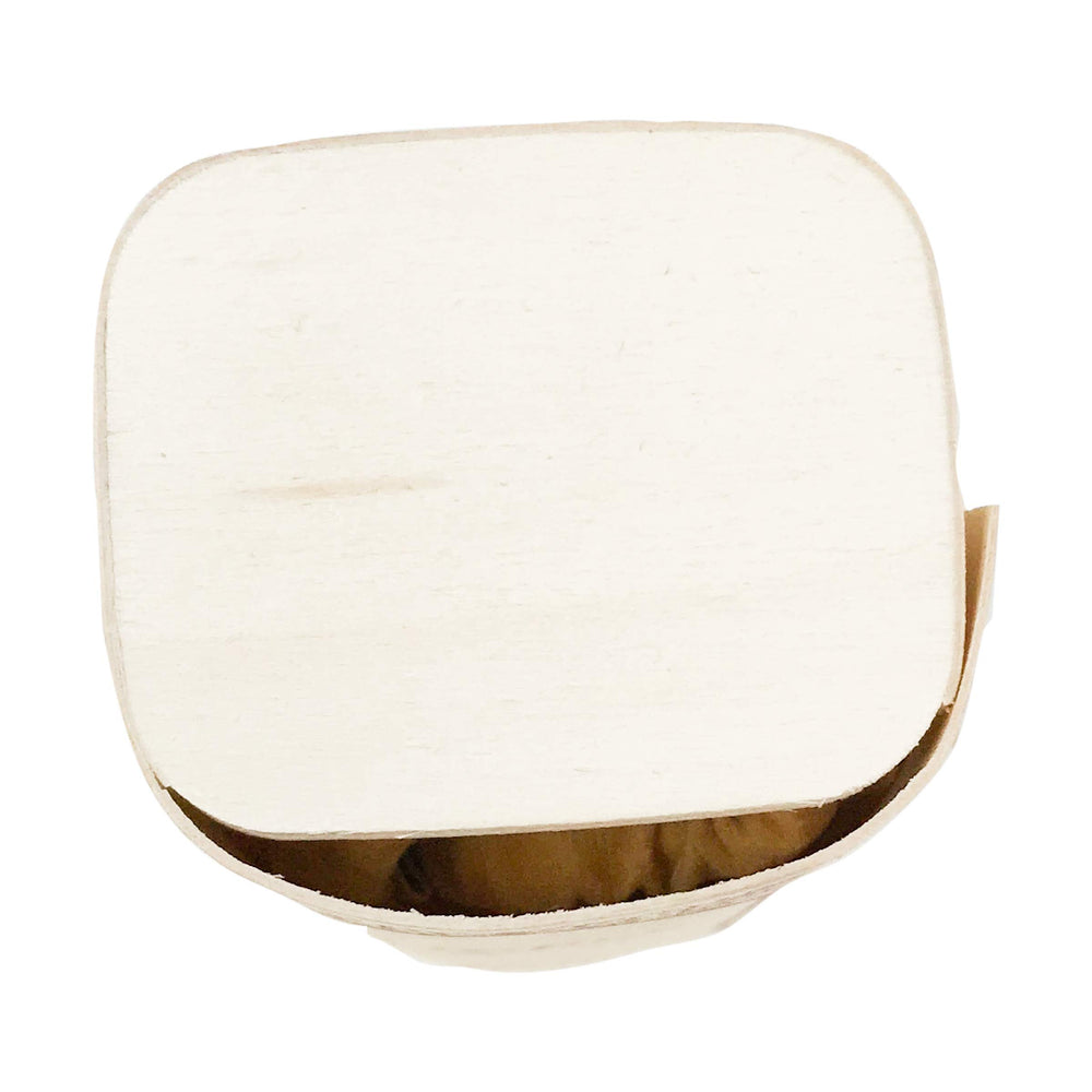 Nemat Amber perfume on table ambience suggests versatile use for occasions.
