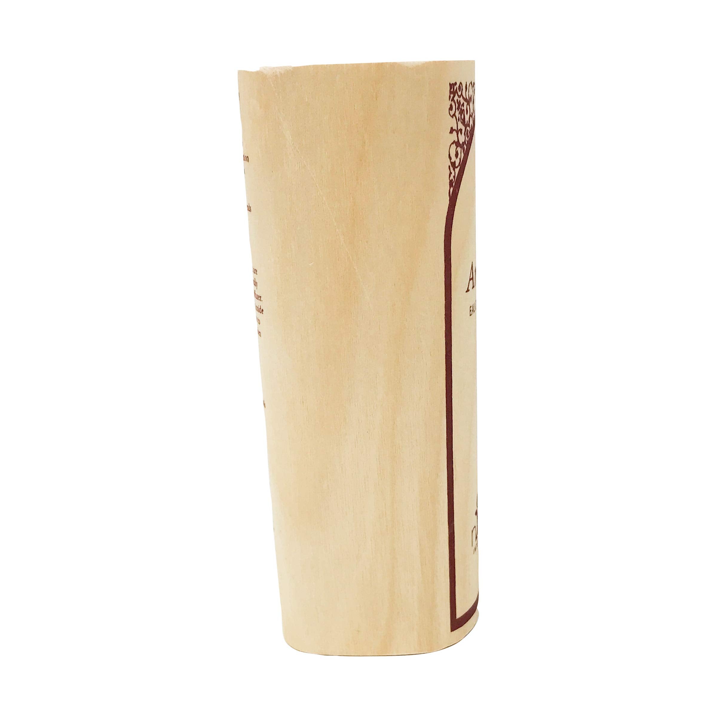 Nemat Amber bottle with embossed label conveys mindful luxury and clean beauty.