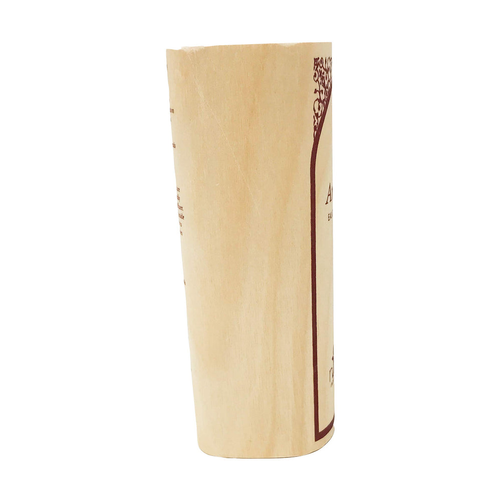 Nemat Amber bottle with embossed label conveys mindful luxury and clean beauty.