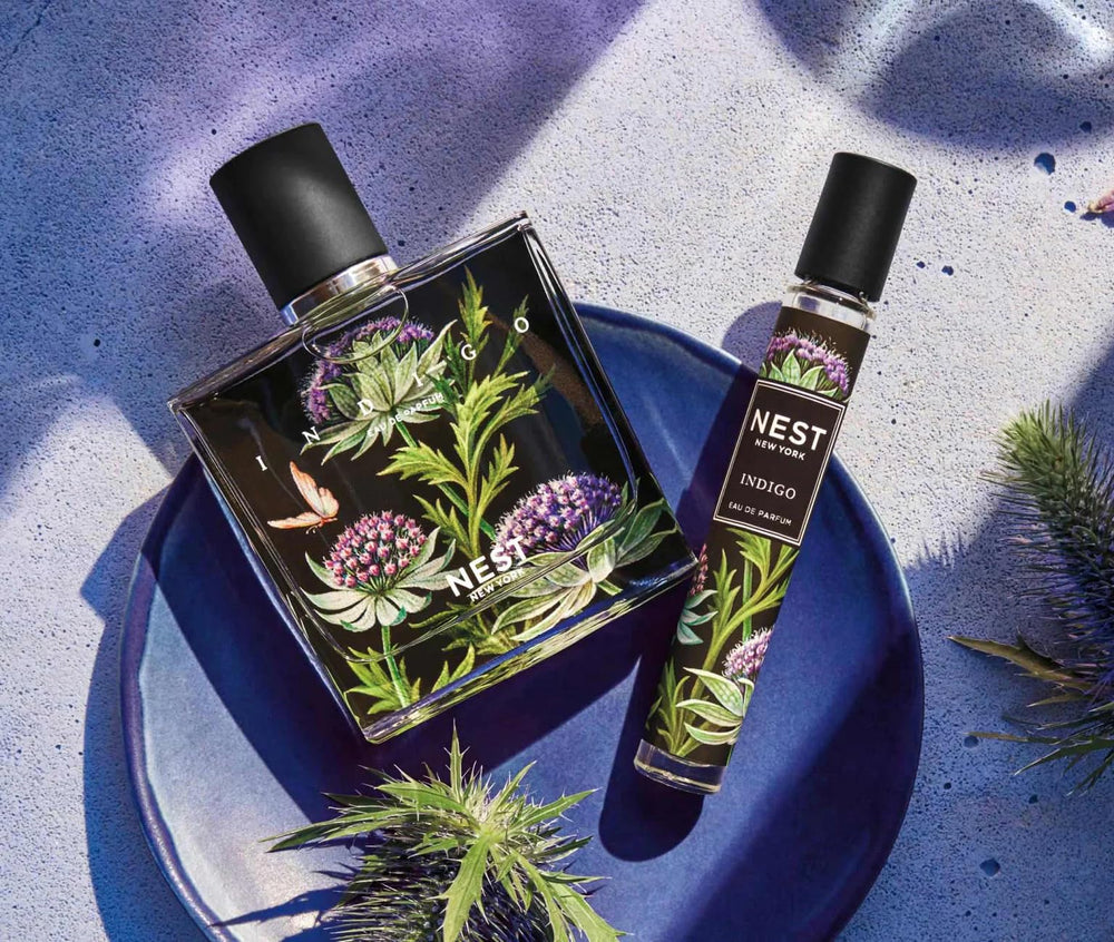 NEST New York Indigo EDP travel spray beside the bottle for Mediterranean-inspired daily wear.