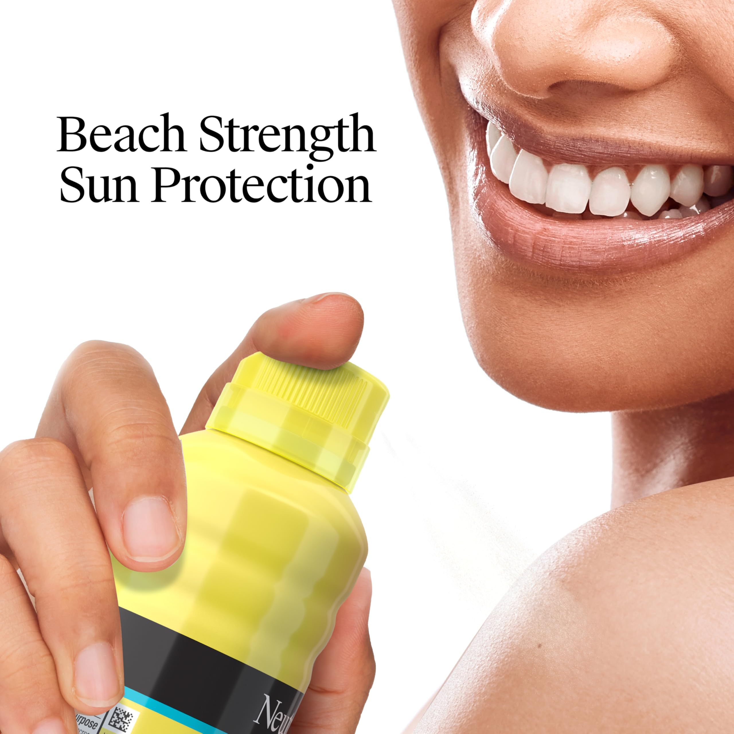Sunscreen spray on beach towel ready for sun sessions by the shore