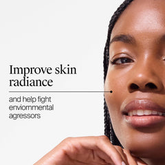 Neutrogena Invisible Daily Defense sunscreen lotion applied with no white cast on skin.